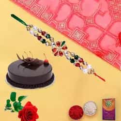 Yummy chocolaty cake and rose with free Rakhi roli...