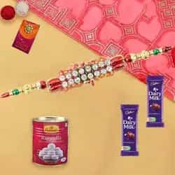 Two Dairy Milks and Rasgulla with Rakhi and Roli T...