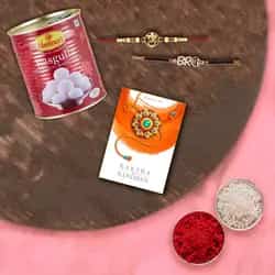Tempting Haldiram Rosogollas with 2 Rakhis and Rol...