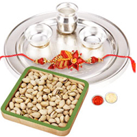 Outstanding Composition of Silver Thali, Rakhi and...
