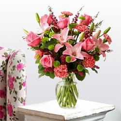 Royal arrangement of Lilies, Roses and Carnations...