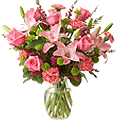 Royal arrangement of Lilies, Roses and Carnations...