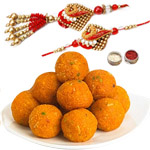 Modish Bhaiya Bhabhi Rakhi Set Along With Scrumptious Bundi Laddoo Modish Bhaiya Bhabhi Rakhi Set Along With Scrumptious Bundi Laddoo