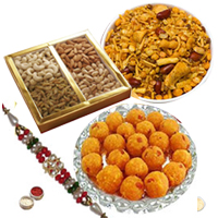 Charming Rakhi Hamper of Traditional Treats Charming Rakhi Hamper of Traditional Treats