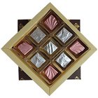 Mesmerising Gift of 9 Pcs Assorted Homemade Chocolates Mesmerising Gift of 9 Pcs Assorted Homemade Chocolates