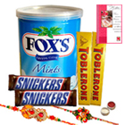Imported Chocolate Hamper with Two Rakhis and Roli Tilak Chawal Imported Chocolate Hamper with Two Rakhis and Roli Tilak Chawal