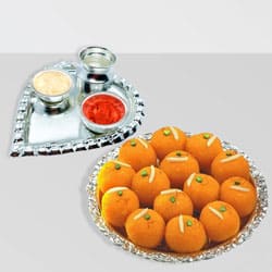 Silver Plated Paan Shaped Puja Aarti Thali (weight 52 gms) with Motichur Laddu from Haldiram Silver Plated Paan Shaped Puja Aarti Thali (weight 52 gms) with Motichur Laddu from Haldiram