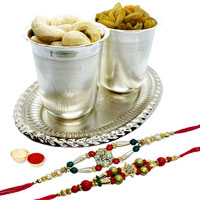 Special dry fruit hamper in Silver plated Glass and tray with 2 free Rakhi, Roli tilak and Chawal Special dry fruit hamper in Silver plated Glass and tray with 2 free Rakhi, Roli tilak and Chawal