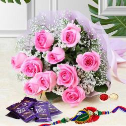 Jubilant Assort of Flowerets and Comfits With Rakhi Jubilant Assort of Flowerets and Comfits With Rakhi