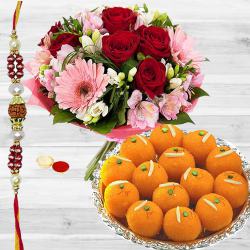 Rhapsodic Blossom Olio with 250 gms. Ladoo and One pc. Rakhi Rhapsodic Blossom Olio with 250 gms. Ladoo and One pc. Rakhi
