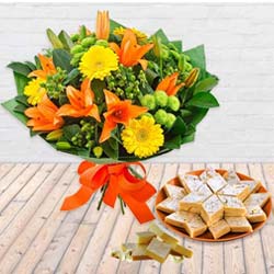 Soft Kaju Barfi Delights with Bouquet of Seasonal Flowers Soft Kaju Barfi Delights with Bouquet of Seasonal Flowers
