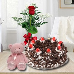 Delicious Cake with charming Red Roses and cute Teddy Bear Delicious Cake with charming Red Roses and cute Teddy Bear