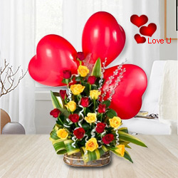 Multicolored Roses arrangement with Red heart shaped Balloons Multicolored Roses arrangement with Red heart shaped Balloons