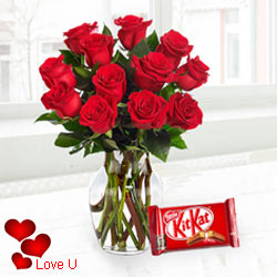 Exclusive <font color =#FF0000> Dutch Red </font> Roses in Vase with free Cadburys Chocolate Exclusive <font color =#FF0000> Dutch Red </font> Roses in Vase with free Cadburys Chocolate