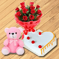 Heavenly 12 Dutch Red Roses with Teddy Bear and 1/2 Kg Heart Shaped Cake Heavenly 12 Dutch Red Roses with Teddy Bear and 1/2 Kg Heart Shaped Cake