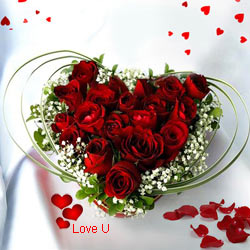12 Dutch Red Roses in Heart Shape Arrangement 12 Dutch Red Roses in Heart Shape Arrangement