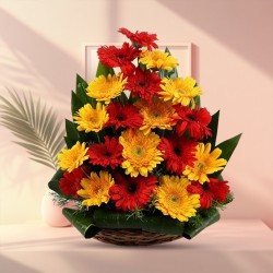 Majestic Table Top Arrangement of Yellow N Red Gerbera Flowers Majestic Table Top Arrangement of Yellow N Red Gerbera Flowers