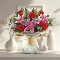Delicate display of Pink Lilies N Red Roses in Bouquet Delicate display of Pink Lilies N Red Roses in Bouquet
