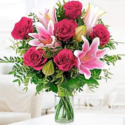 Aromatic Assemble of Pink Lilies with Red Roses in Glass Vase Aromatic Assemble of Pink Lilies with Red Roses in Glass Vase
