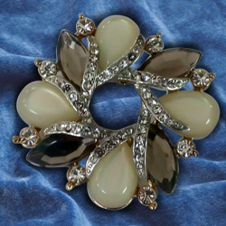 Awe Inspiring Opal Rhinestone Brooch Cum Pendant from Avon Awe Inspiring Opal Rhinestone Brooch Cum Pendant from Avon