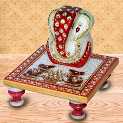 Delicately carved marbel designer ganesh with chowki Delicately carved marbel designer ganesh with chowki