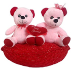 Excellent Two Teddy Bears Sitting on Red Cushion Excellent Two Teddy Bears Sitting on Red Cushion