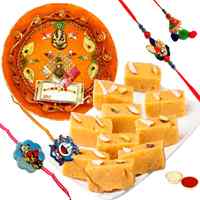 Charming Gift of Mysore Pak, 1 Bhaiya Bhabhi Rakhi, 2 Kids Rakhi and 1 Rakhi Thali Charming Gift of Mysore Pak, 1 Bhaiya Bhabhi Rakhi, 2 Kids Rakhi and 1 Rakhi Thali