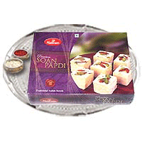 Silver plated thali with Roli Tika and Sagun Sweets Silver plated thali with Roli Tika and Sagun Sweets