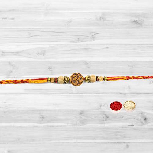 Rakhi with Pious Om in the Middle Rakhi with Pious Om in the Middle