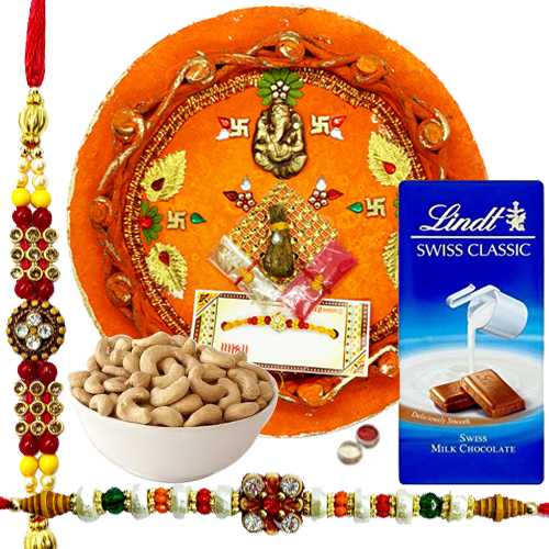 Heart Winning Rakhi Combo Of 2 Rakhi, Rakhi Thali, Cashews N Lindt Swiss Chocolate Heart Winning Rakhi Combo Of 2 Rakhi, Rakhi Thali, Cashews N Lindt Swiss Chocolate