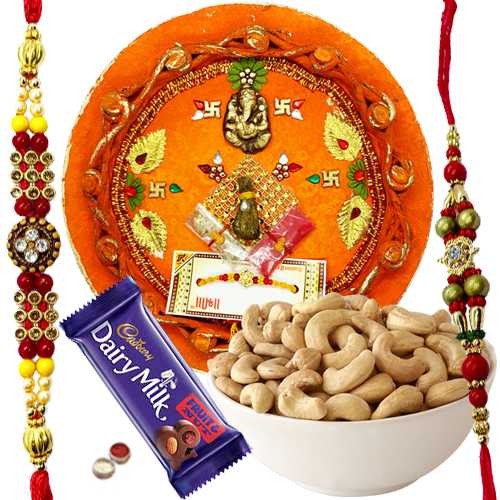 Arresting Rakhi Combo Of 2 Rakhi, Rakhi Thali, Cashew N Cadbury Fruit N Nuts Arresting Rakhi Combo Of 2 Rakhi, Rakhi Thali, Cashew N Cadbury Fruit N Nuts