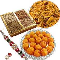 Charming Rakhi Hamper of Traditional Treats Charming Rakhi Hamper of Traditional Treats