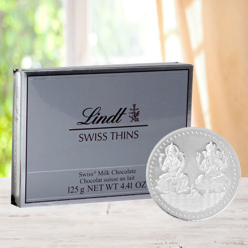 Lindt Chocolates with free silver plated coin for Diwali. Lindt Chocolates with free silver plated coin for Diwali.
