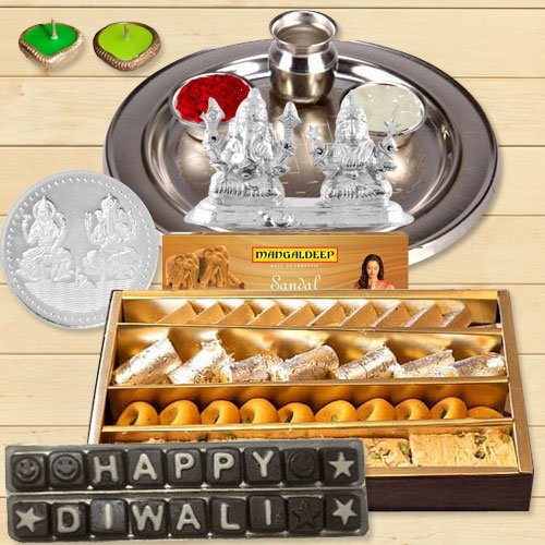 Silver Laxmi Puja Hamper with Assorted Sweets and Chocolate for Diwali Silver Laxmi Puja Hamper with Assorted Sweets and Chocolate for Diwali