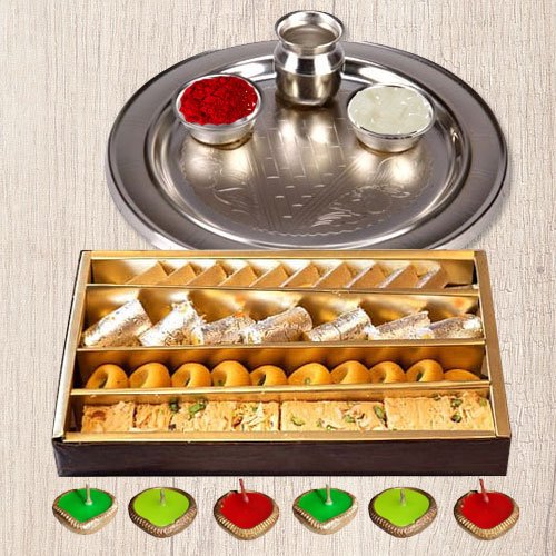 Silver Puja Thali, Diya N Haldirams Assorted Sweets. Silver Puja Thali, Diya N Haldirams Assorted Sweets.