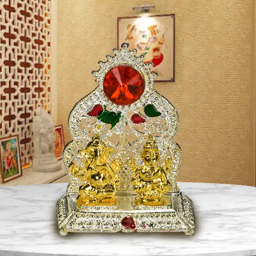 Silver Plated mandap with Golden Ganesh Laxmi Idol