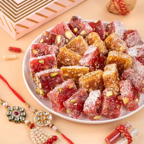Exquisite Rakhis  N  Pomegranate Pistachio Treat Box